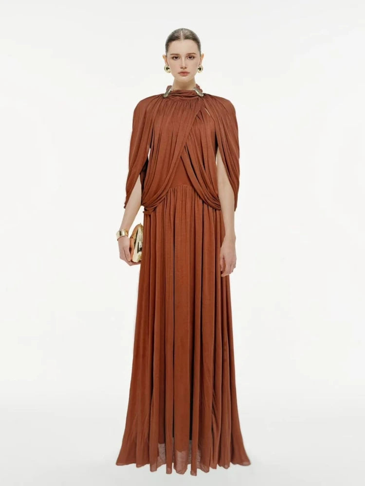 Woman wearing a brown evening gown on a white background