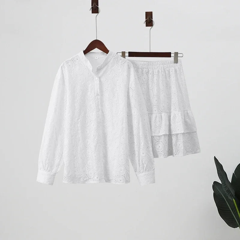 White shirt and shorts set on hangers