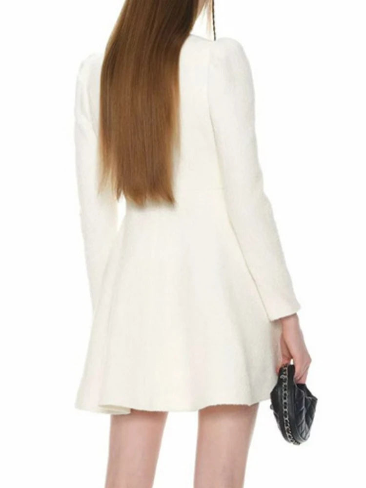 White dress worn by a person- back view