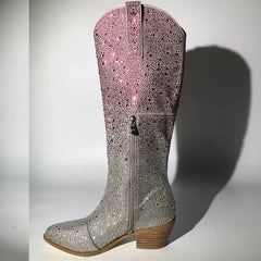 Silver glittery boot with a wooden sole on a white background