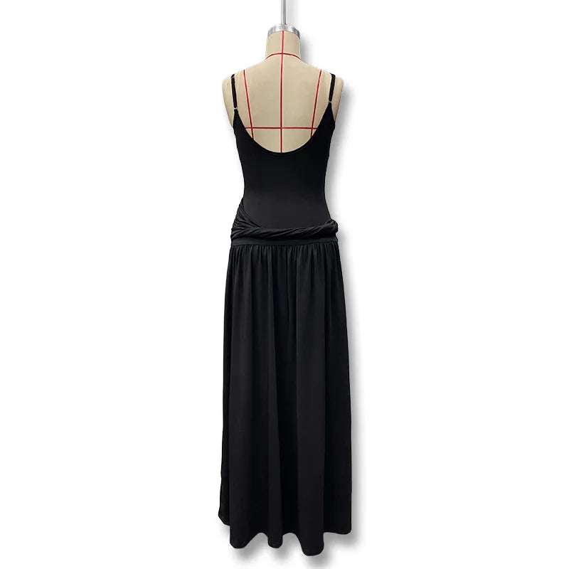 Black dress on a mannequin with a white background