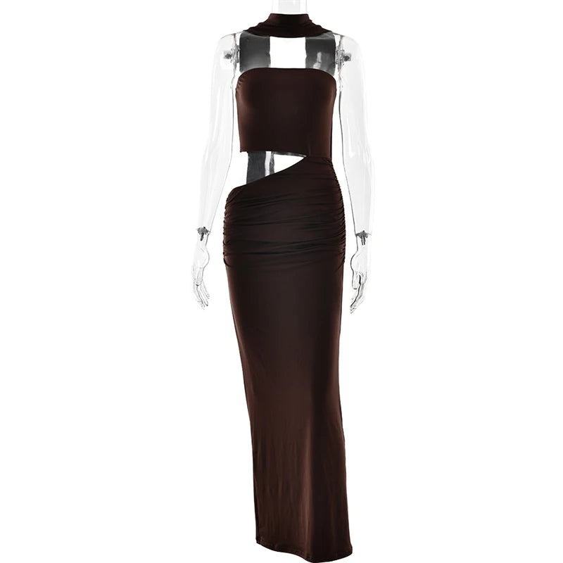 Brown strapless maxi dress with a side cutout and halter neck displayed on a mannequin against a white background.
