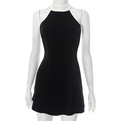 Black dress on a mannequin against a white background