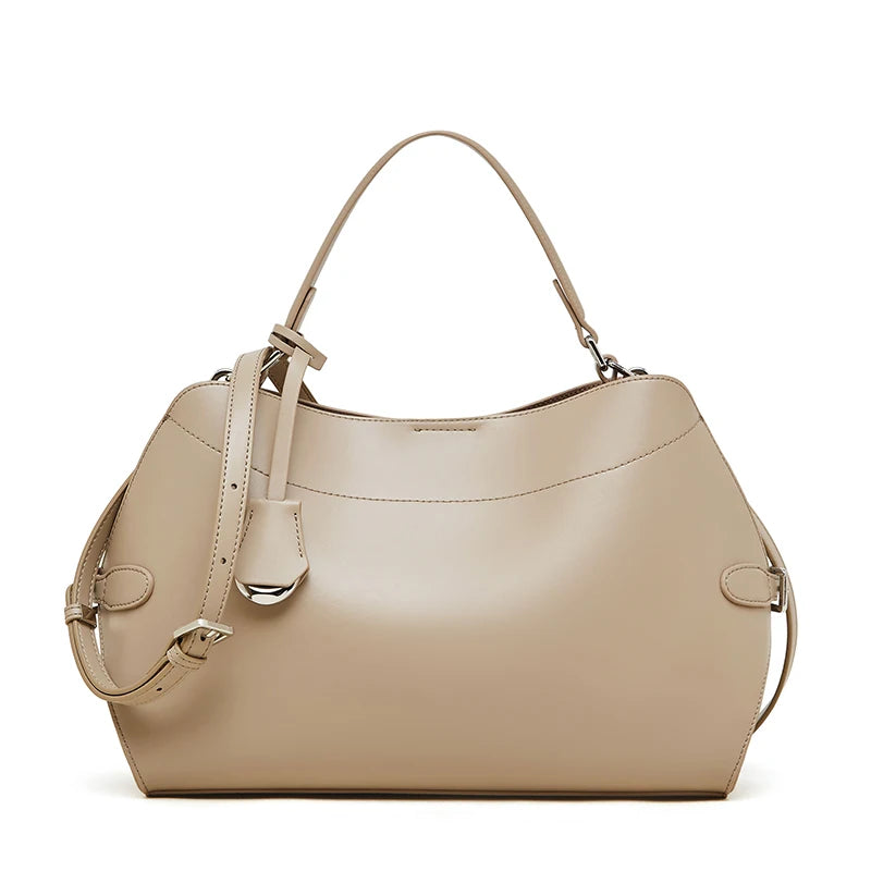 Beige handbag on a white background