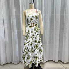 Floral dress on a mannequin against a plain background