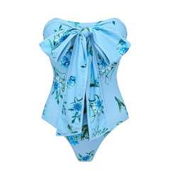 Close-up of the blue floral print bandeau swimsuit with bow detail.