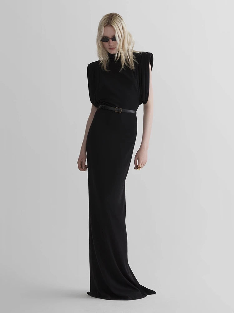 Black turtleneck padded shoulder maxi dress front view