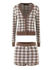 Brown and white checkered cardigan and shorts set on a white background