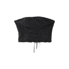 Black lace crop top on a white background