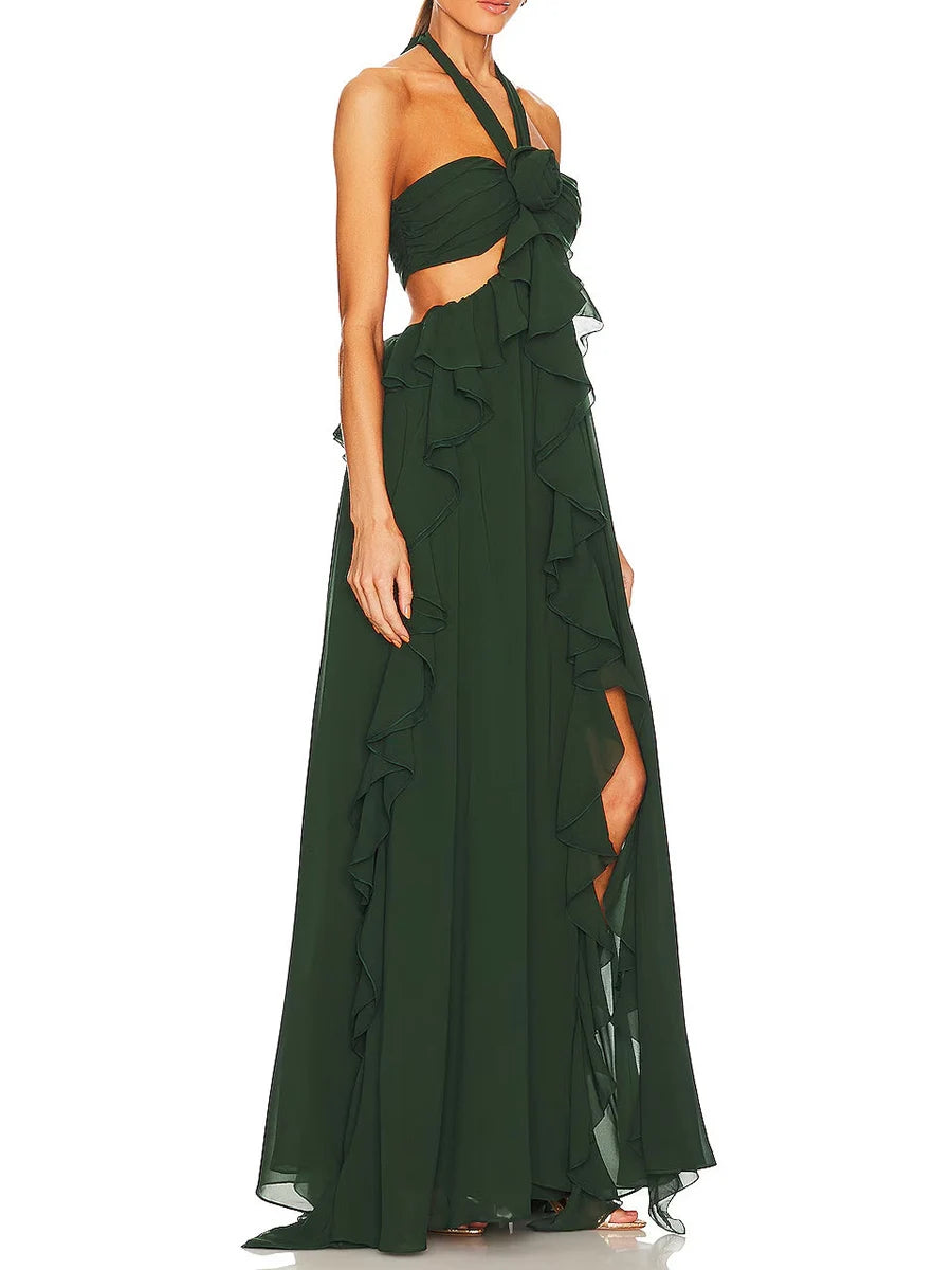 Green evening gown with cut-out design on a white background