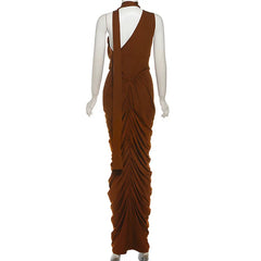 Brown evening gown on a mannequin against a white background