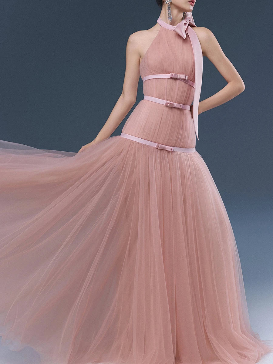 Pink halter bow tulle maxi dress dynamic side view