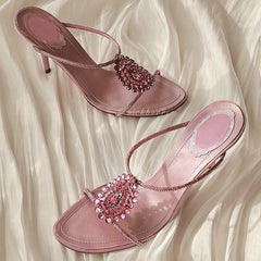 Crystal embellished thin heel sandals with an open toe.