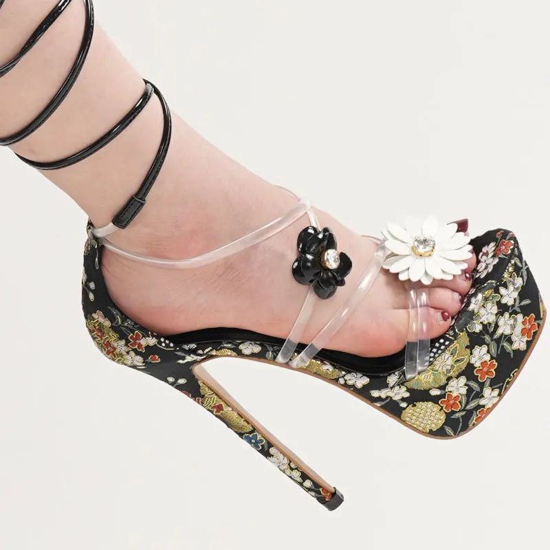 High-heeled shoe with floral design and clear anklets