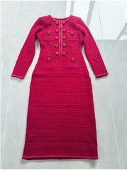 Pink dress with floral embellishments on a light gray background