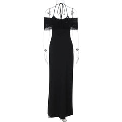 Black evening gown with sheer sleeves on a white background