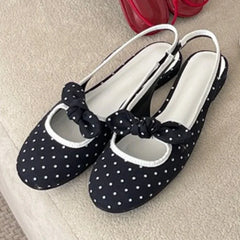Polka dot bow slingback pumps with round toe