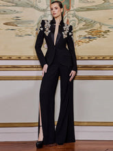 Embellished blazer and wide-leg pants suit on a model