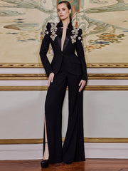 Embellished blazer and wide-leg pants suit on a model