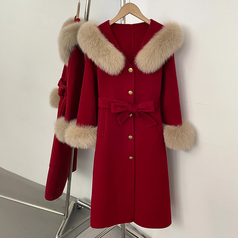 Red wool coat with fox fur collar and cuffs, belted.