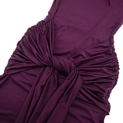 Close-up of a purple dress with a knot detail