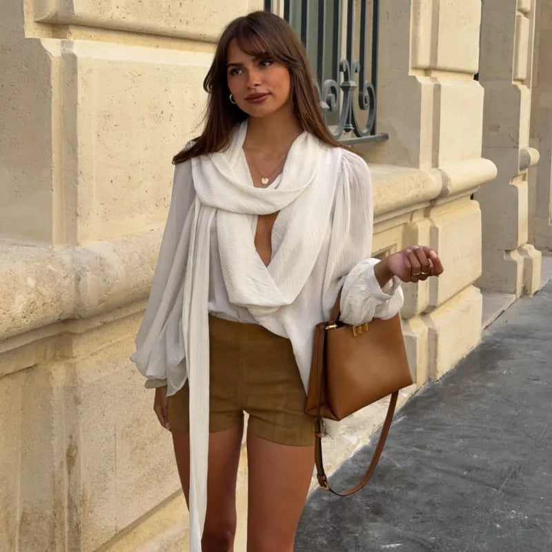 Draped V-neck long sleeve top styled with scarf detail