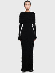 Black evening gown with ruched design and silver embellishments on a white background