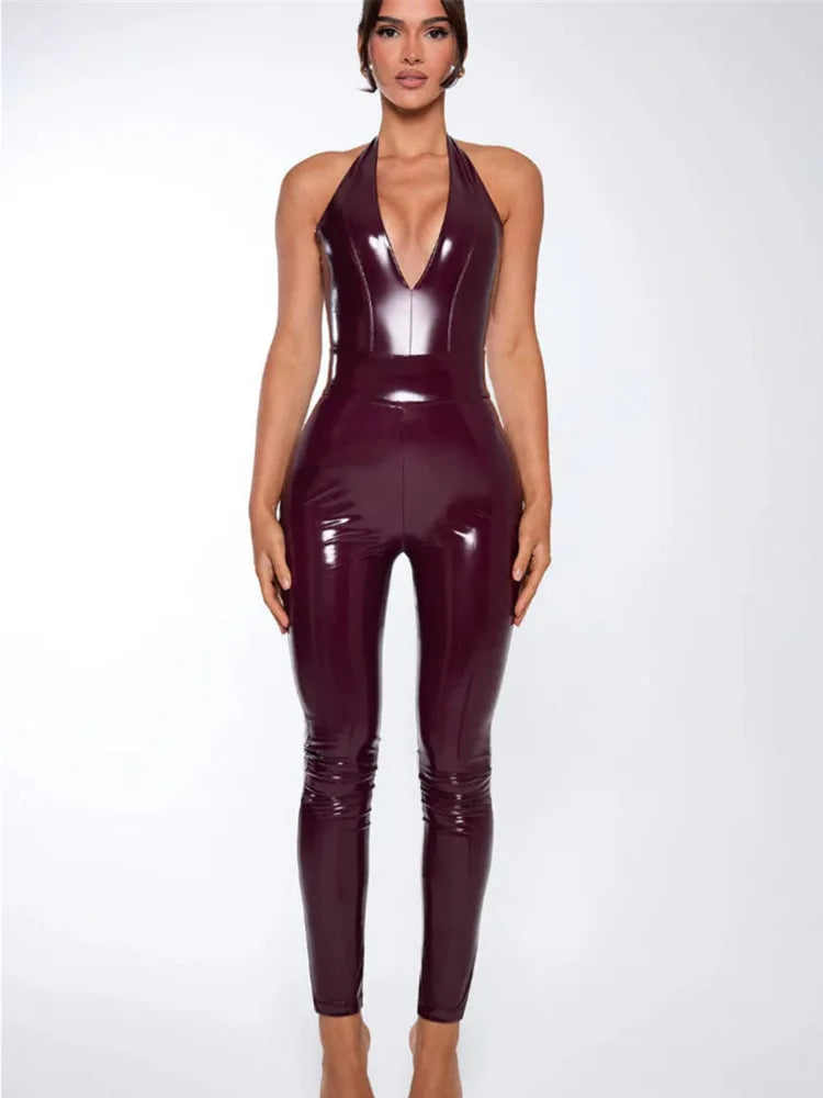 Woman wearing a shiny burgundy jumpsuit