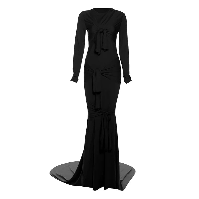 Black long-sleeve gown with a tie detail