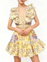 Ruffled V-neck sleeveless tiered mini dress with floral print