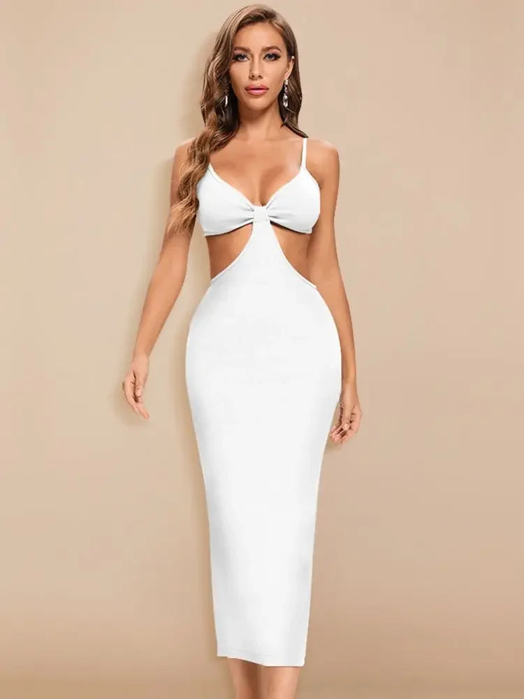 White cut-out dress worn by a model on a beige background