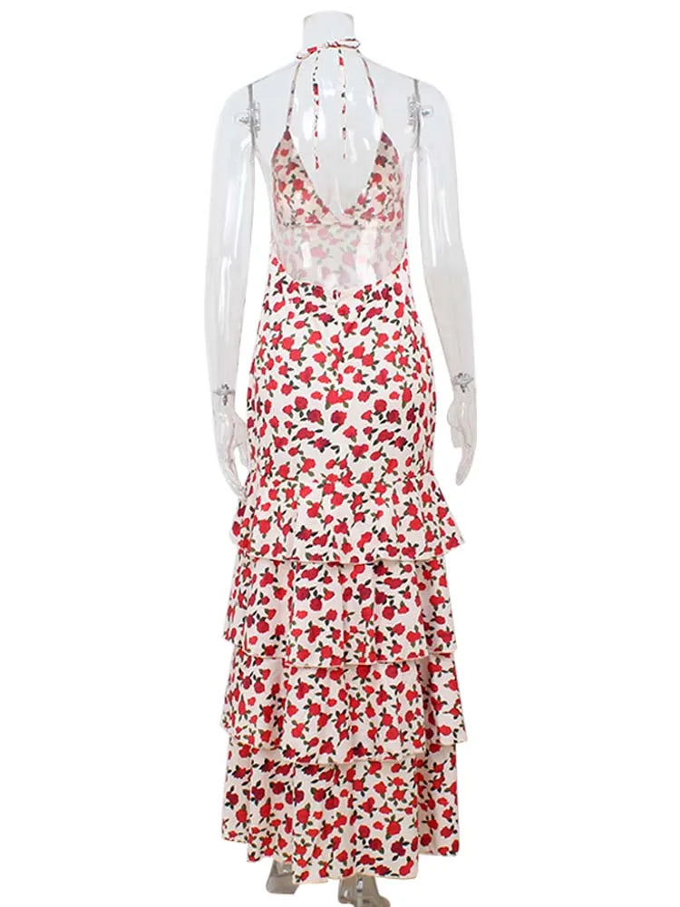 Floral dress on a mannequin against a white background