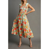 Light blue floral print smocked square neck maxi dress with tie shoulder straps.