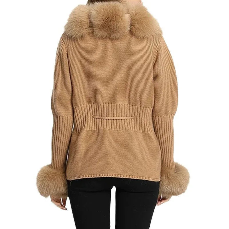 Beige sweater with fur trim on a white background