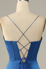 Blue dress with criss-cross back on a mannequin against a neutral background