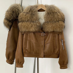 Brown leather jacket with fur collar on a hanger against a white background