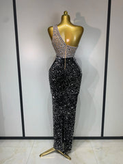 One-shoulder rhinestone dress, back view.