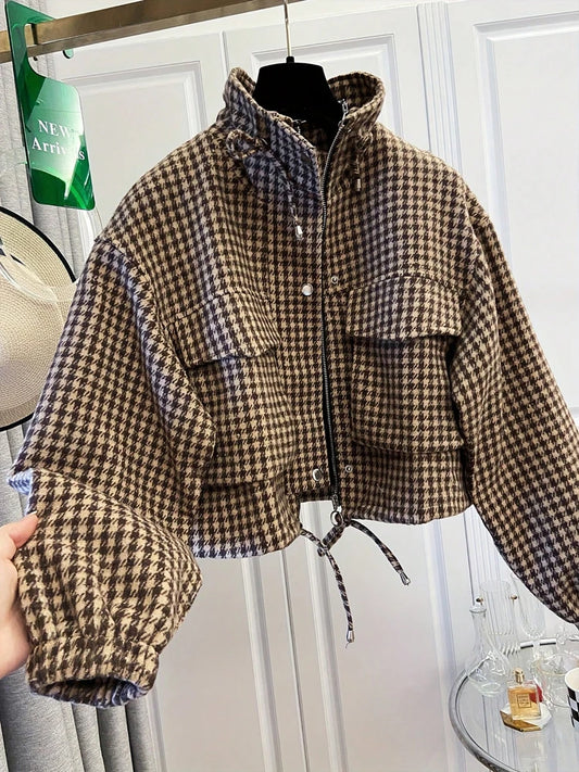 Houndstooth print cropped bomber jacket with stand-up collar and drawstring hem, front view.