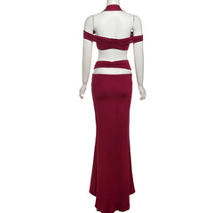 Red evening gown on a mannequin against a white background