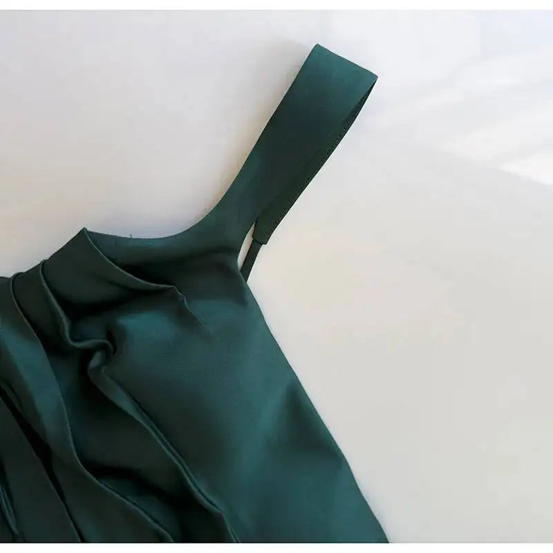 Close-up of the square neckline and strap of a maxi dress