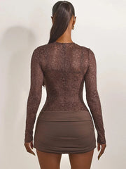 Brown lace long-sleeve top and skirt set on a plain background
