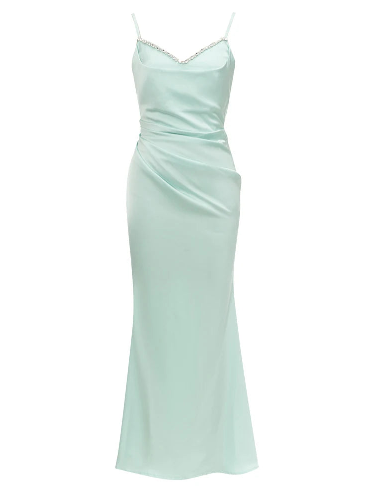 Mint green evening gown on a white background