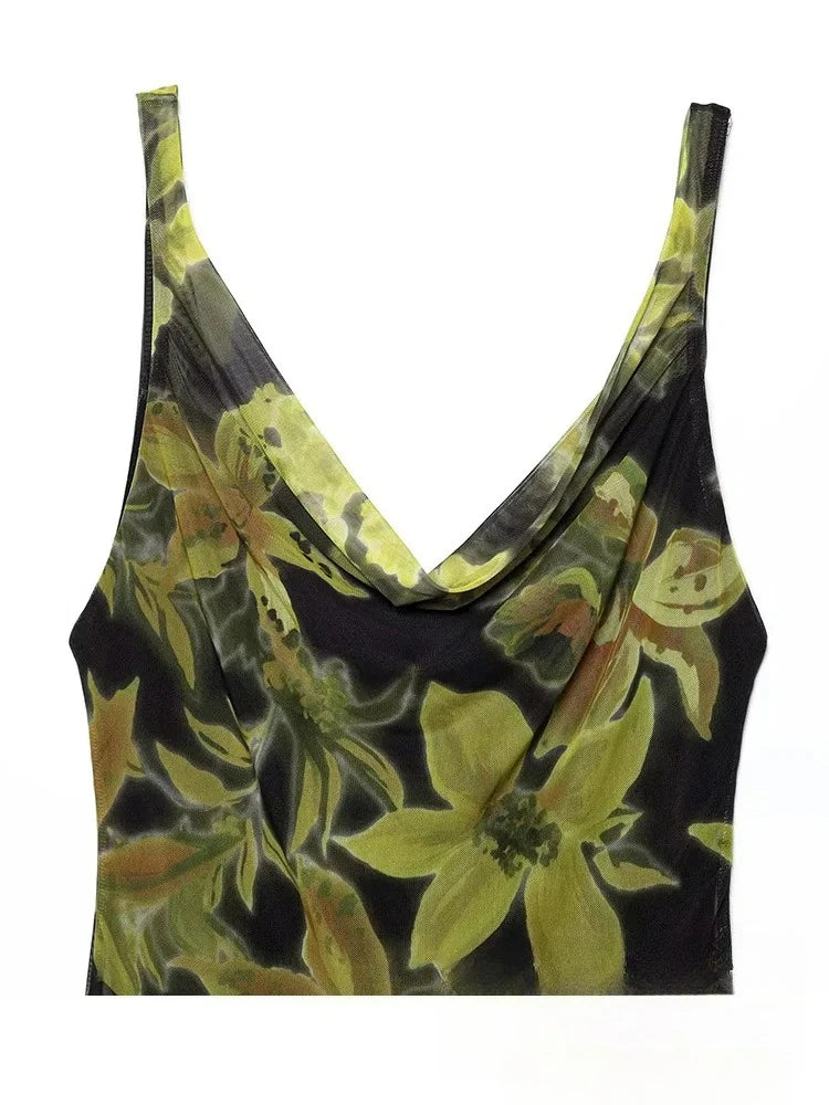 Close-up of the cowl neckline on a floral print mesh dress