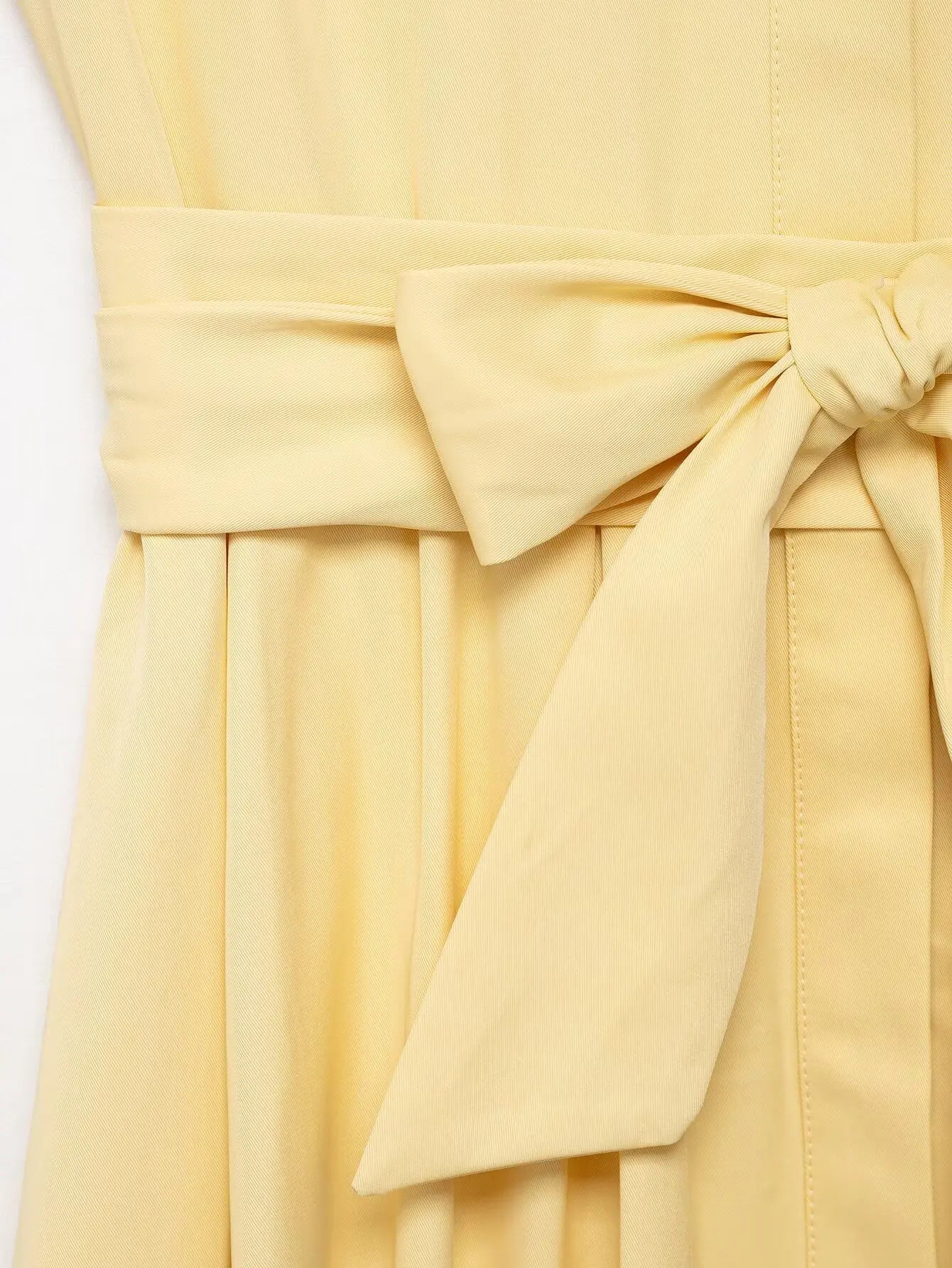 Yellow dress with a large bow detail