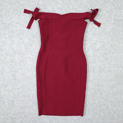 Red off-shoulder dress on a light gray background