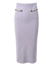 Light purple ribbed skirt with decorative buttons on a white background