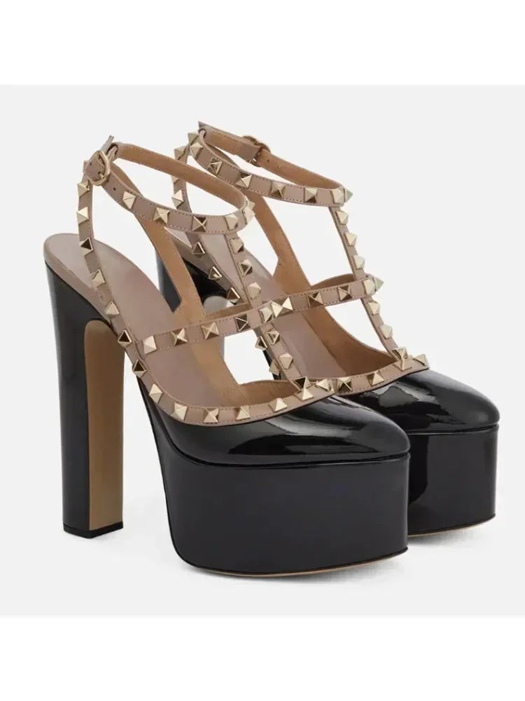 Black platform high-heeled shoes with beige studded straps