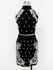 Beaded paisley halter neck crop top and mini skirt on mannequin