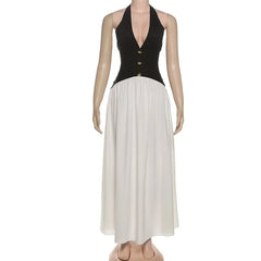 Mannequin wearing a black halter top and white skirt on a white background