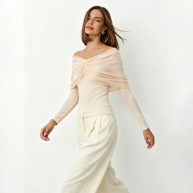 Off-shoulder pleated mesh top in motion